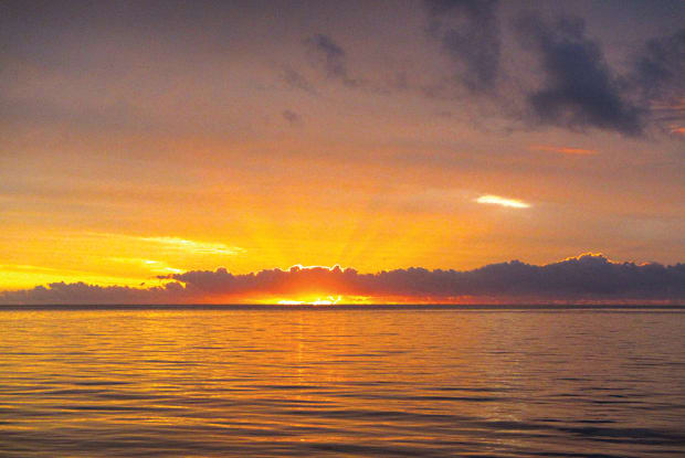 Exploring the Gambier Islands of the South Pacific on a Catamaran ...