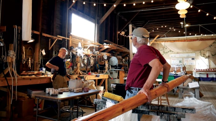 The rigging gang confers in its workshop, located in the historic Bath Frieght Shed