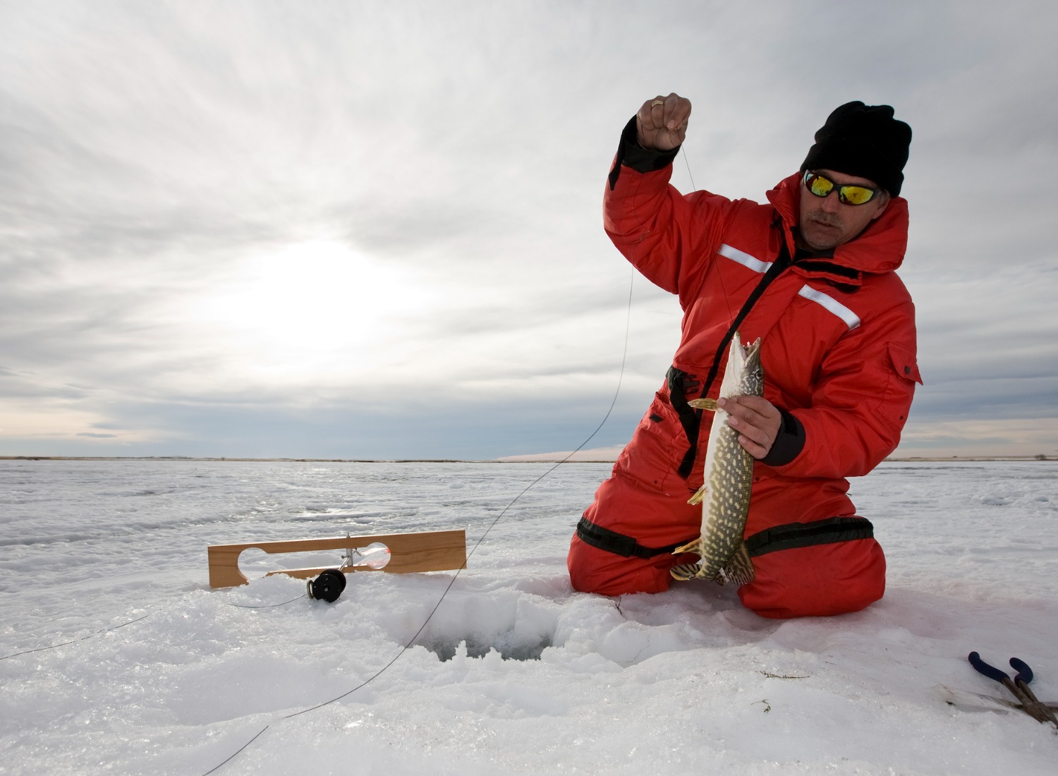 Ice Fishing Tip-Up: How to Set One up for Maximum Yield