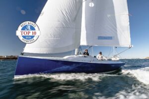 J/7 undersail with a badge stating: Top 10 Best Boats 2026 Nominee