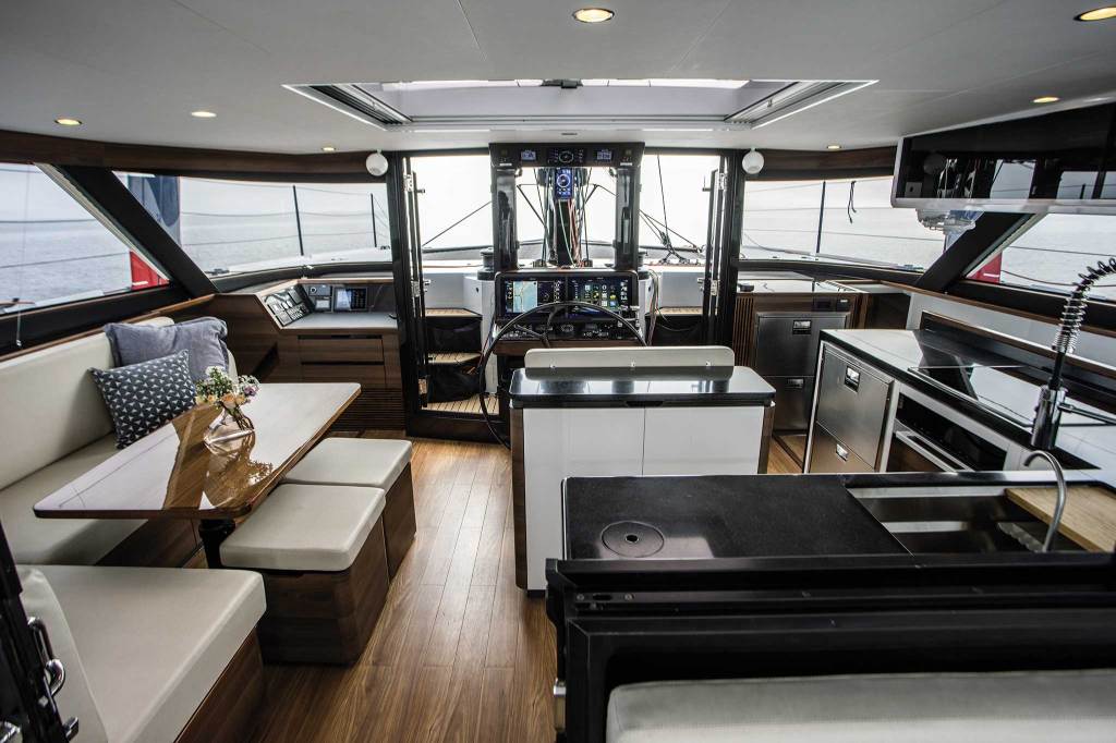 The interior helm station delivers all the information you could possibly need to one central location, and it keeps the driver right in the social heart of the boat without passengers traipsing through their space.