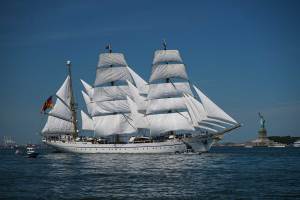 Tallship in New York with the statue of liberty